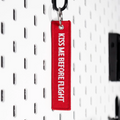 Cliché - Kiss Me Before Flight Keytag